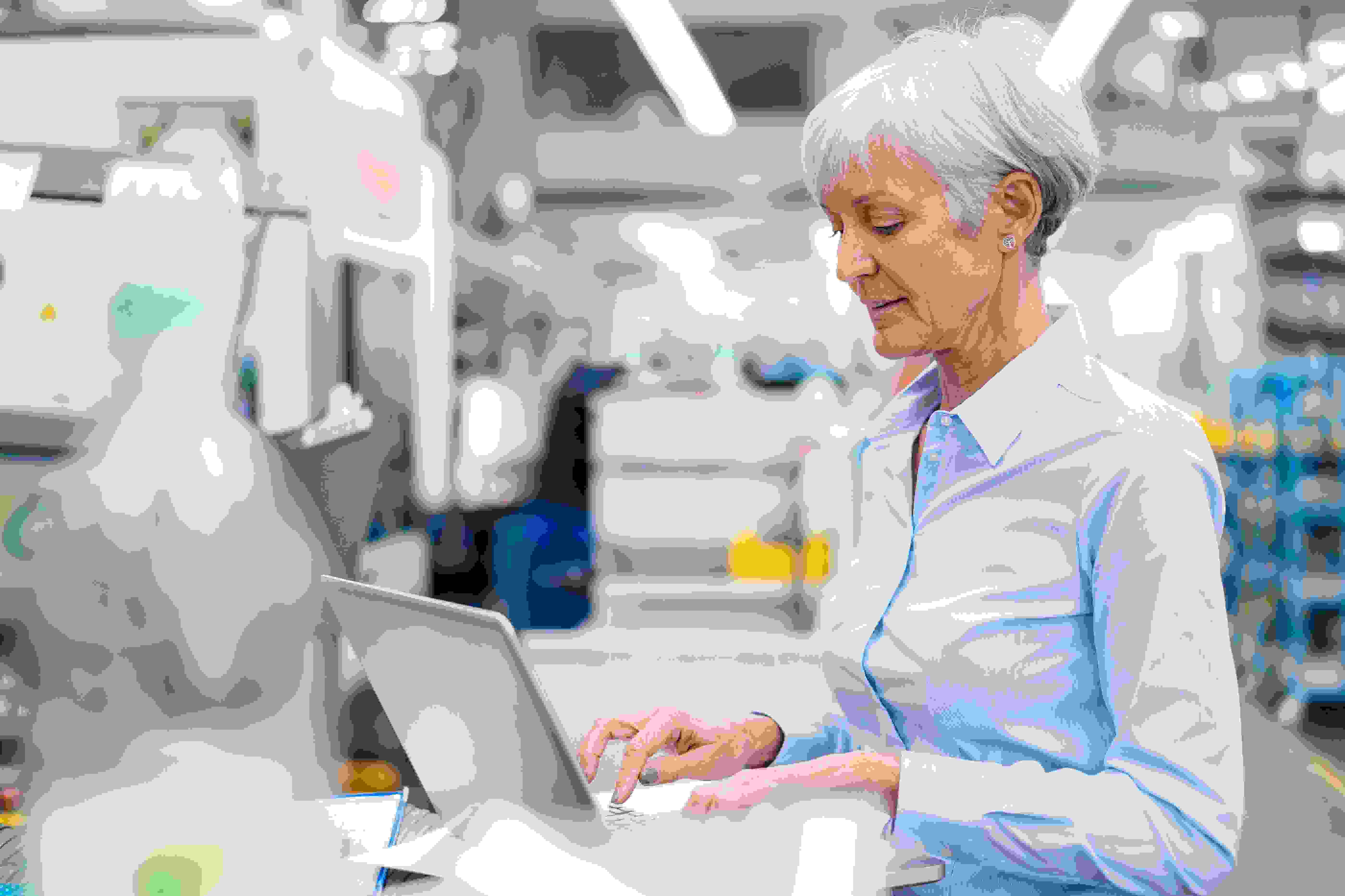 Senior Businesswoman Using Laptop In A Factory 2022 03 08 00 58 15 Utc